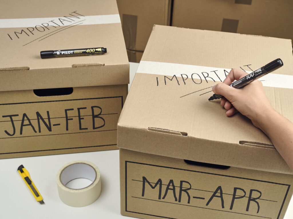 permanent marker on cardboard box